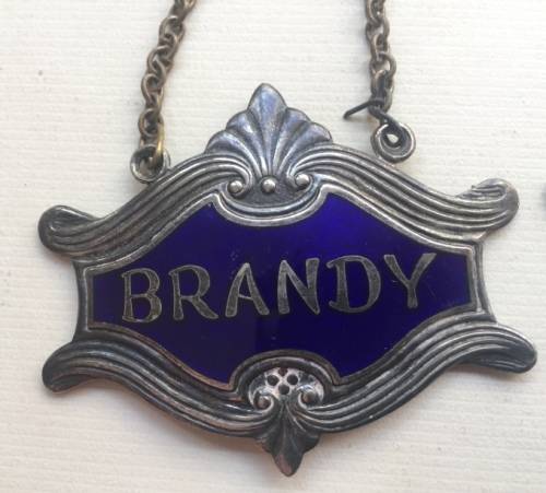 VINTAGE WHISKY, BRANDY and GIN DECANTER , ENAMELED BRASS NECK TAGS