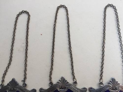 VINTAGE WHISKY, BRANDY and GIN DECANTER , ENAMELED BRASS NECK TAGS