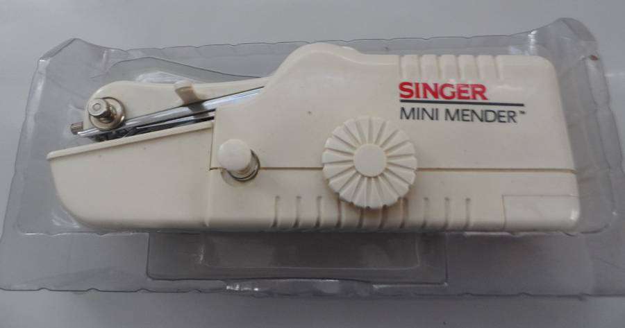 SINGER , PORTABLE, MINI MENDER model CFX300KN