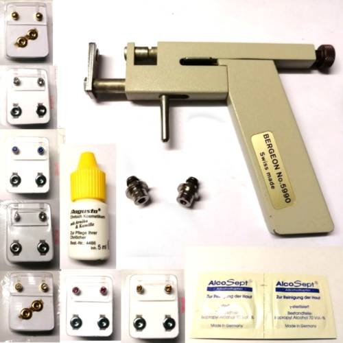 Piercing Set - Piercing Gun incl. 2 change Parts - 52pairs Earrings- 47 Fluids -92 antisept pads