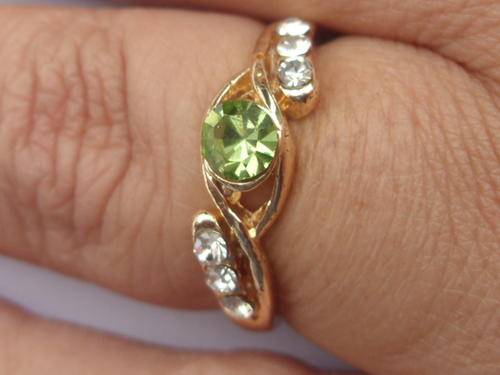 Golden Ring with Emerald and six Diamonds