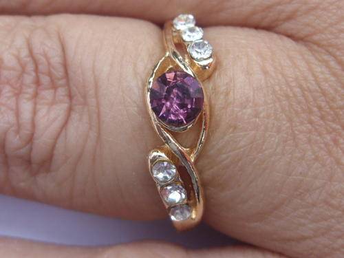 Golden Ring with Amethyst and six Diamonds