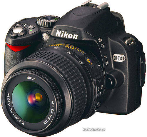 Nikon D60 + Nikon DX 18-55mm lens.  Mint condition in original box