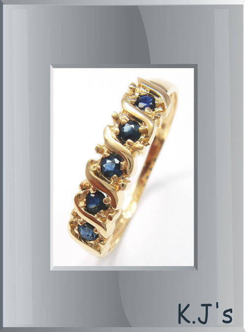 9ct solid gold & genuine saphire ring