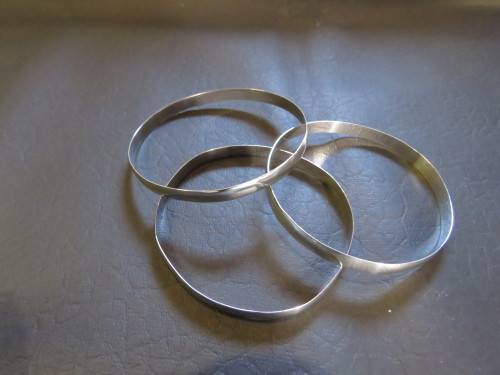 Three Sterling Silver Bangles as on lot