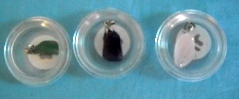 GEM STONES IN CONTAINER
