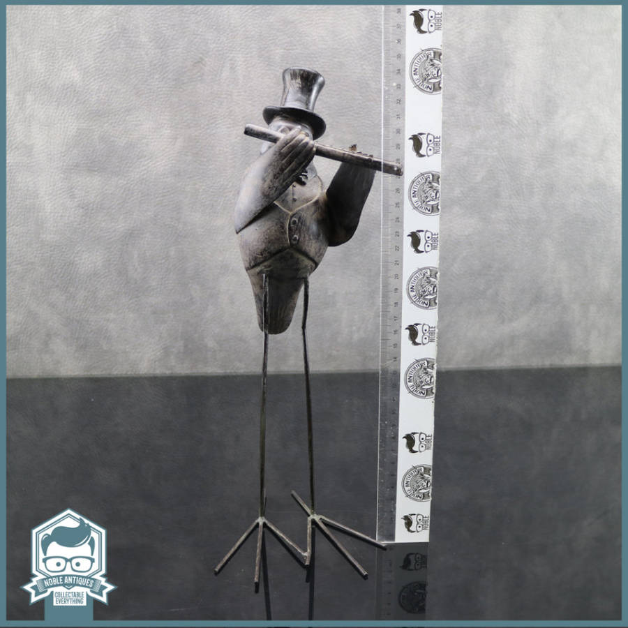 Large Cast Resin and Metal Feet Bird Flute Player!!!