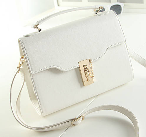 Small size square handbag. White color. Stock in ZA.