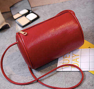 Fashion cylinder bag. Black color. Stock in ZA.