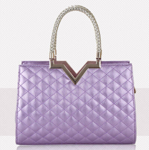 Classic magazines size ladies handbag. Purple color.