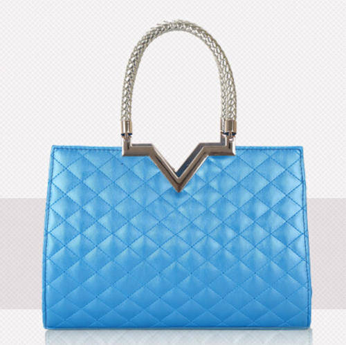 Classic magazines size ladies handbag. Blue color.