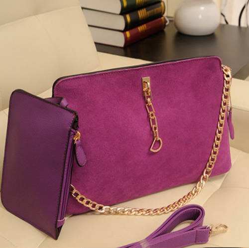2 pieces nubuck elegant ladies handbag with chain and belt. purple color. Stock in ZA