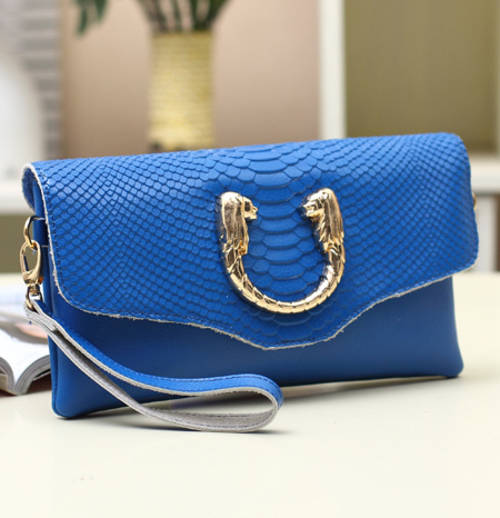 The second layer genuine cow leather clutches. Blue color.