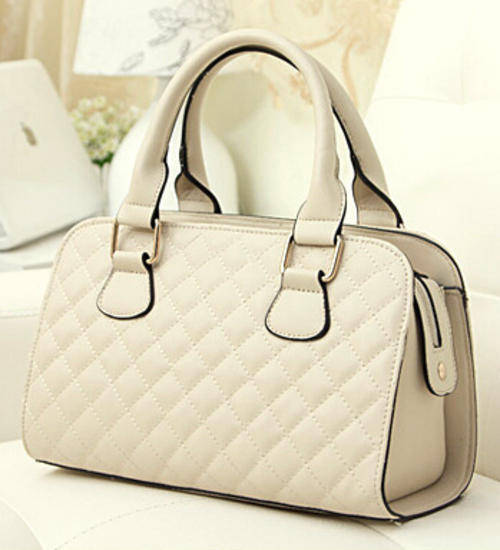 Elegant medium size useful work or leisure handbag. Rice color. Stock in ZA