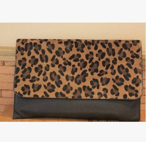 Leopard pattern ladies clutch. Stock in ZA