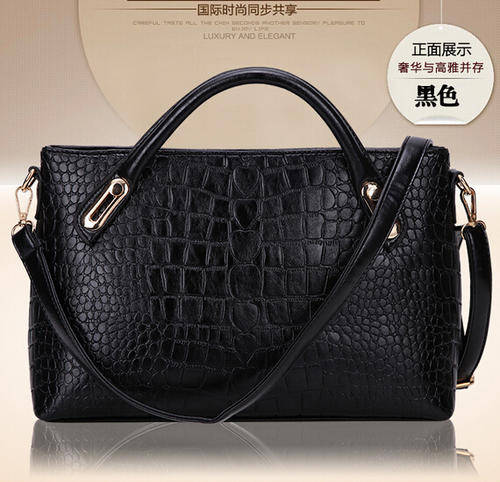 Crocodile pattern wild use ladies handbag with strape. Black color. In my own stock