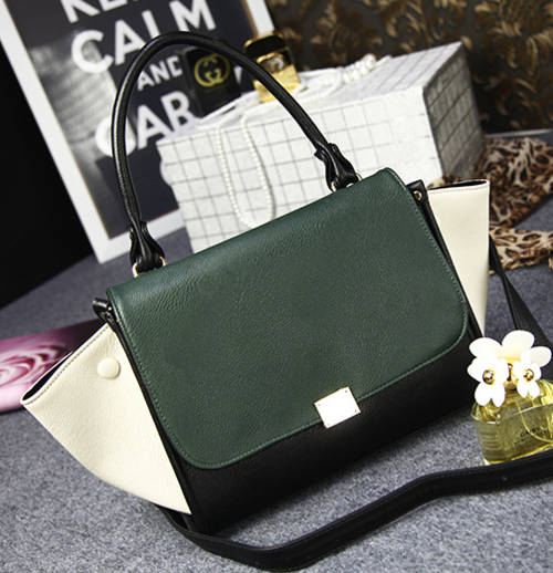 Classic design smily bat style ladies handbag with strape. Nubuck green. Stock in ZA