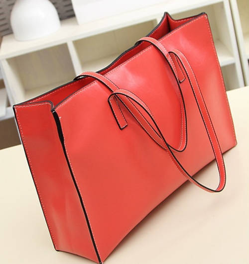 Simply design wild match large handbag. Red color. Stock in ZA