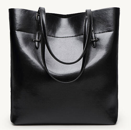 Smooth surface fashion large capacity ladies handbag with strape, Blackb color. Stock in ZA