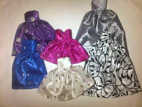 assorted hand made barbie doll clothes