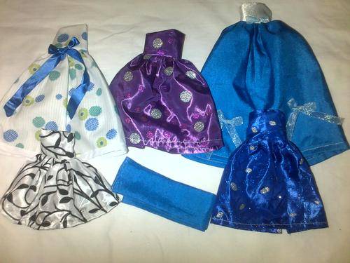 assorted hand made barbie doll clothes