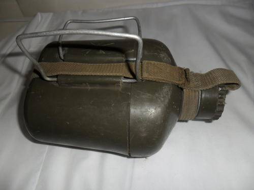 Rhodesian water bottle, good condition with plastic fire bucket and webbing strap.