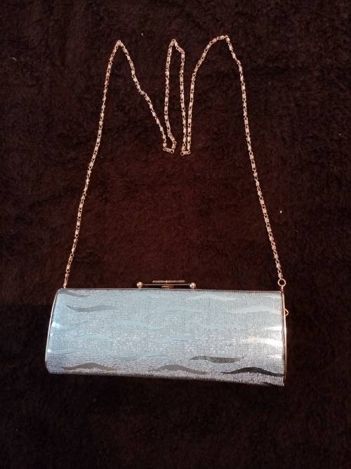 Light blue glitter clutch bag as new
