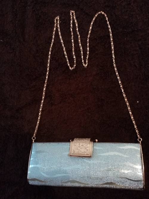 Light blue glitter clutch bag as new