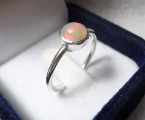 Genuine ETHIOPIAN OPAL SET IN SOLID STERLING with Nice Flashes