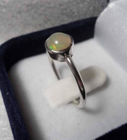 Genuine ETHIOPIAN OPAL SET IN SOLID STERLING with Nice Flashes