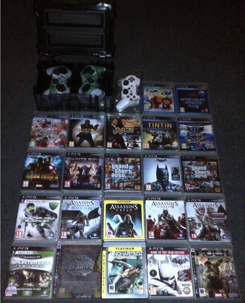 Playstation 3 Super Slim 500GB + 36 games + 3 wireless controls + Ammo Box Dual docking charger PS3