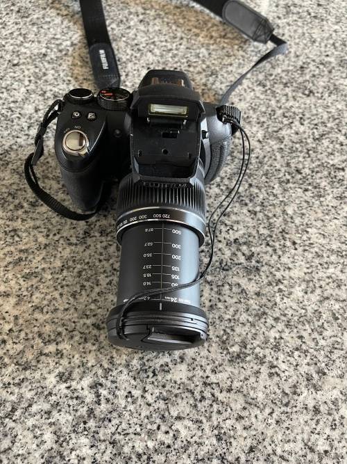 Fujifilm FinePix HS10 10 MP CMOS Digital Camera with 30x Wide Angle Optical Zoom and 3-Inch LCD