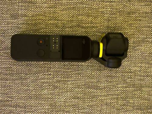 DJI Osmo Pocket - Handheld 3-Axis Gimbal Stabilizer with integrated Camera 12 MP 1/2.3