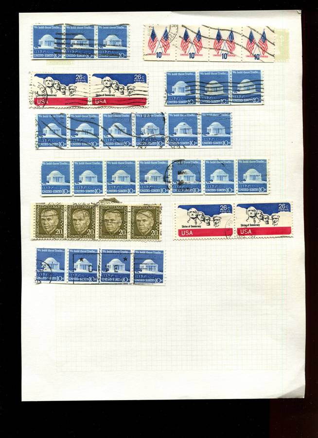 USA in Multiples - 35 Stamps  Mounted On Old Album Page