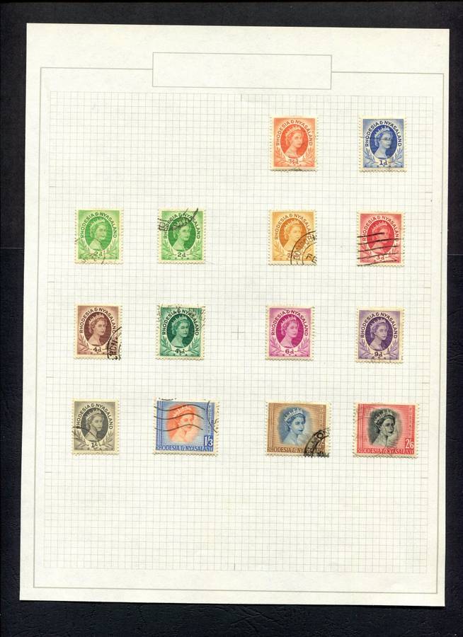 Rhodesia and Nyasaland - 14 Stamps Mounted On Old Album Page