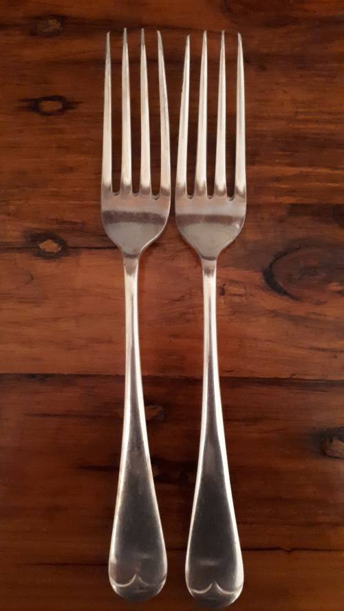 A PAIR OF DIXON VINTAGE SILVER PLATED dinner forks