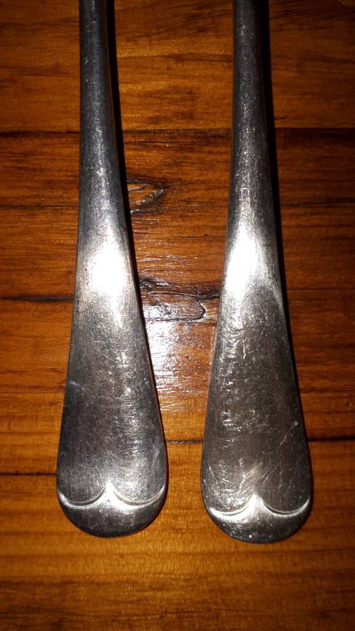 A PAIR OF DIXON VINTAGE SILVER PLATED dinner forks