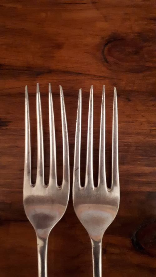 A PAIR OF DIXON VINTAGE SILVER PLATED dinner forks