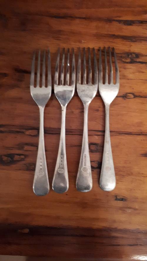 A SET OF FOUR VINTAGE SILVER PLATED Dinner Forks