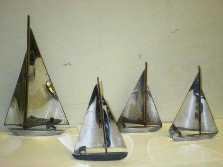 Set of four Art Deco chrome yachts