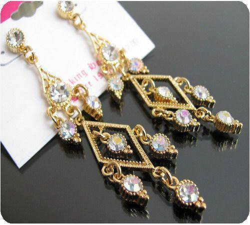 Exquisite 16 stone Genuine Crystal Earrings clad in 18K Yellow Gold !!
