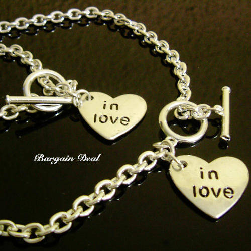 R100 only !! 2pcs Silver Bracelet and Necklace Set with " in love" heart shaped pendant !!