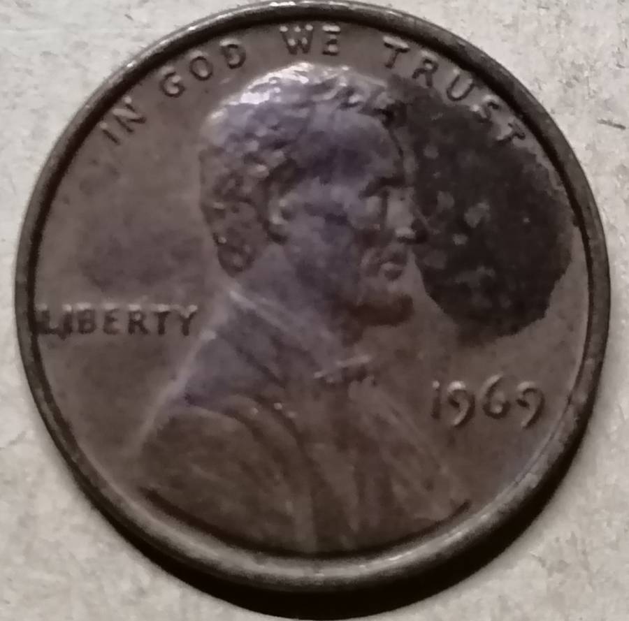 1969 USA  1 Cent Wheat Penny with error (plating/laminating)