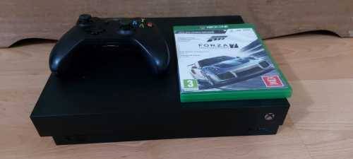 Last one. XBOX ONE X 1TB Console + Controller + Game Excellent working condition