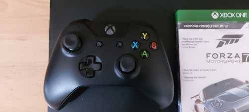Last one. XBOX ONE X 1TB Console + Controller + Game Excellent working condition