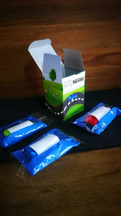 Vintage Nestlé Collectable Cars still in wrapping and box..