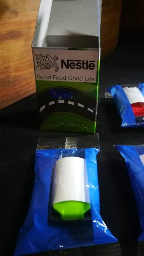 Vintage Nestlé Collectable Cars still in wrapping and box..