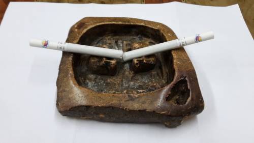 Vintage Hand Carved Rock ashtray .