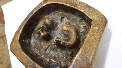 Vintage Hand Carved Rock ashtray .