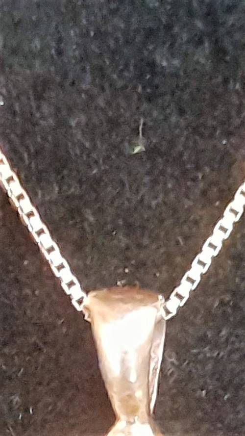 Lovely 9 Carat `Gold Cross and Chain` with small Diamond.